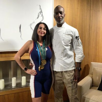 Armine Shamiryan is wearing a sprinter clothes and Michael Johnson is wearing a chef dress.